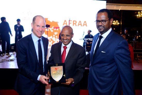 GCEO Ethiopian Airlines Mr. Tewolde GebreMariam (Middle) receiving the award.